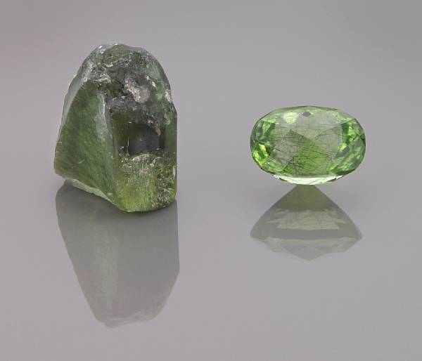 Appraisal: Ludwigite-in-Peridot Rough and Cut Pakistan A fine thumbnail specimen of