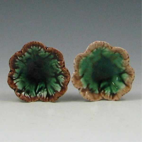 Appraisal: Two Majolica Etruscan Geranium Butter Pats left unmarked chip on