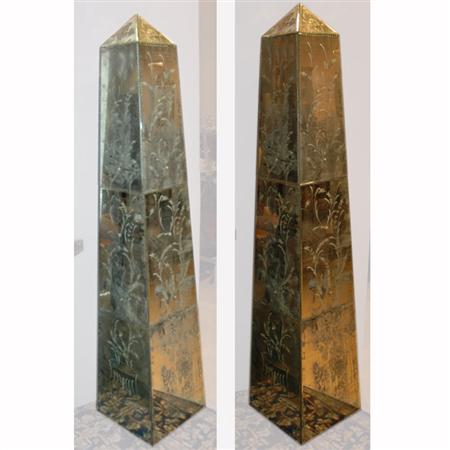 Appraisal: Pair of Faux Engraved Mirrored Obelisks Estimate -