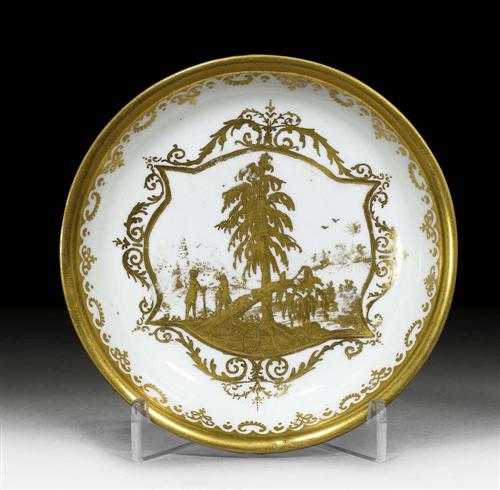 Appraisal: SAUCER WITH ENGRAVED LANDSCAPE IN GOLD Meissen circa From the