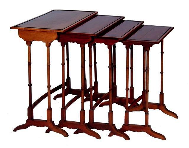 Appraisal: A SET OF EDWARDIAN MAHOGANY QUARTETTO TABLES with satinwood banding