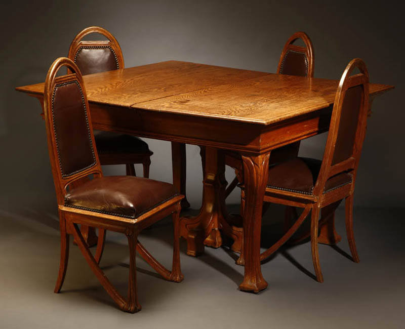 Appraisal: Italian Art Nouveau oak dining table chairs Italian Art Nouveau