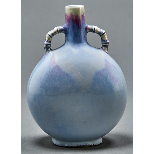 Appraisal: A Chinese flambe glazed moon flask with bamboo form handle