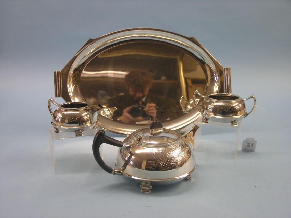 Appraisal: An unusual Art Deco silver plated teaset teapot two-handled sugar