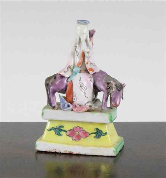 Appraisal: A Chinese enamelled porcelain model of Lu Dongbin th century