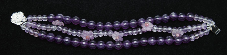 Appraisal: AMETHYST BEAD BRACELET Very nice twisted bead bracelet has two