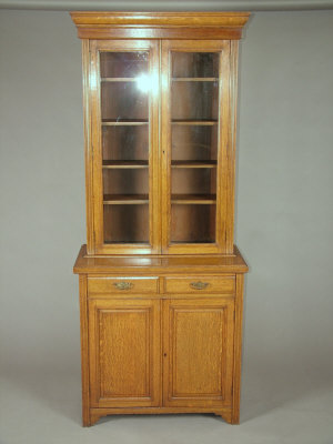 Appraisal: An oak bookcase early th century the moulded cornice above