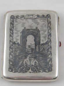 Appraisal: A Russian silver cigarette case with red cabochon thumbpiece and