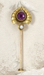 Appraisal: ART NOUVEAU STICKPIN k yellow gold with purple faceted stone