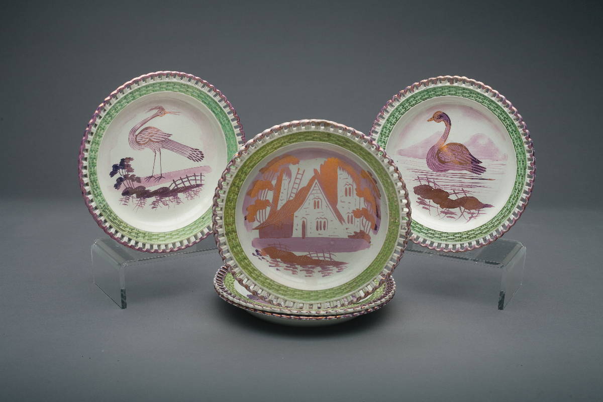 Appraisal: FIVE SWANSEA PINK LUSTRE AND ENAMEL-DECORATED RETICULATED PLATES THREE DILLWYN