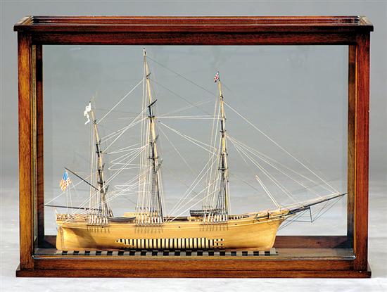 Appraisal: Ship's model in wooded glass case painted wooden clipper ship