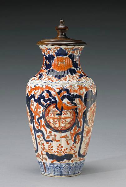 Appraisal: A Japanese Imari porcelain fluted vase Meiji Period The waisted