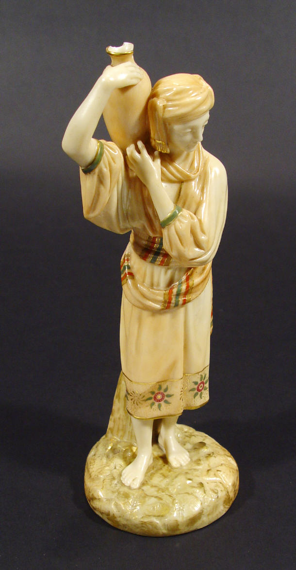 Appraisal: Royal Worcester blush ivory porcelain figure in robes clutching an