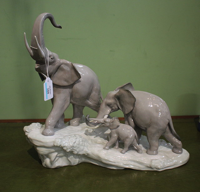 Appraisal: A LLADRO PORCELAIN SCULPTURE OF A FAMILY OF THREE ELEPHANTS