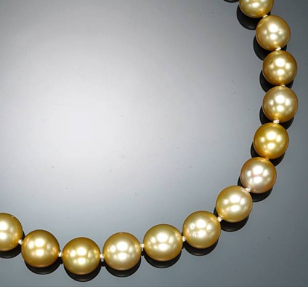 Appraisal: A South Sea cultured pearl and diamond necklace golden pearls