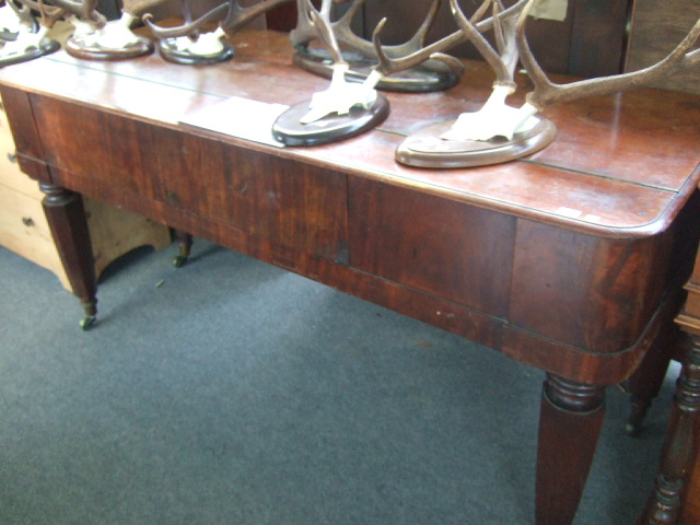 Appraisal: An early th century mahogany framed spinnet the lift top