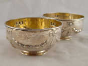 Appraisal: A pair of heavy silver bonbon dishes with embossed swags