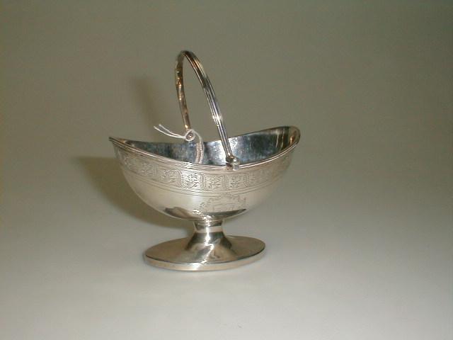 Appraisal: A George III silver boat shaped sugar basket with a