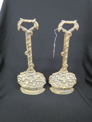 Appraisal: Pair of Cast Iron Figural Doorstops basket of fruit bronzed