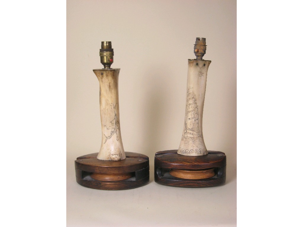 Appraisal: Pair of Table Lamps formed from scrimshaw bones carved ships