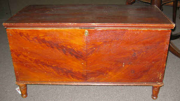 Appraisal: ENGLISH PINE BLANKET CHEST Grain painted as flame figured mahogany