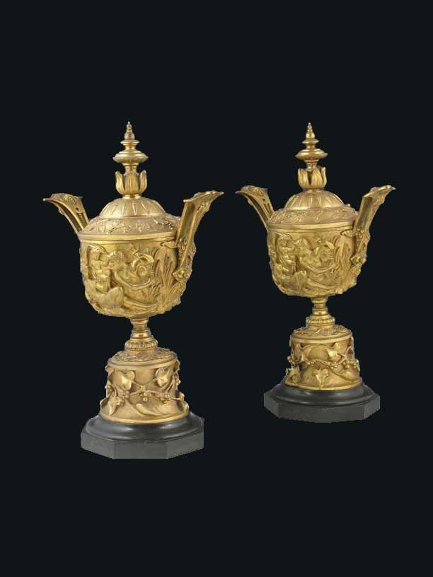 Appraisal: A pair of French gilt bronze vases and covers