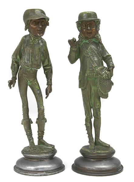 Appraisal: A pair of spelter figural candlesticks height in diameter in