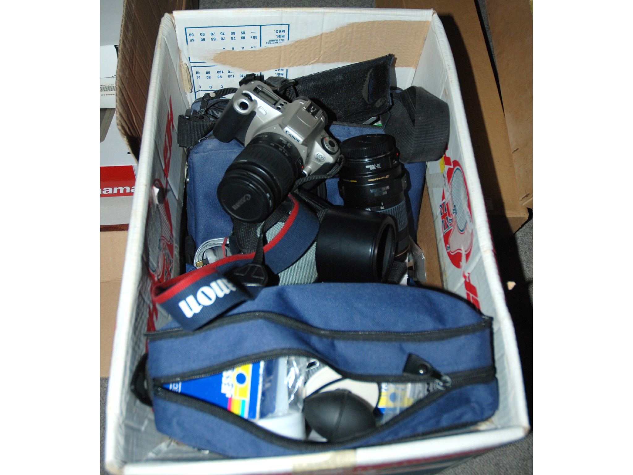 Appraisal: A collection of cameras and camera accessories tripods etc