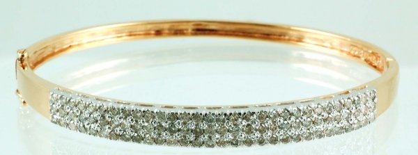 Appraisal: Diamond bangle bracelet in marked K yellow gold with rhodium