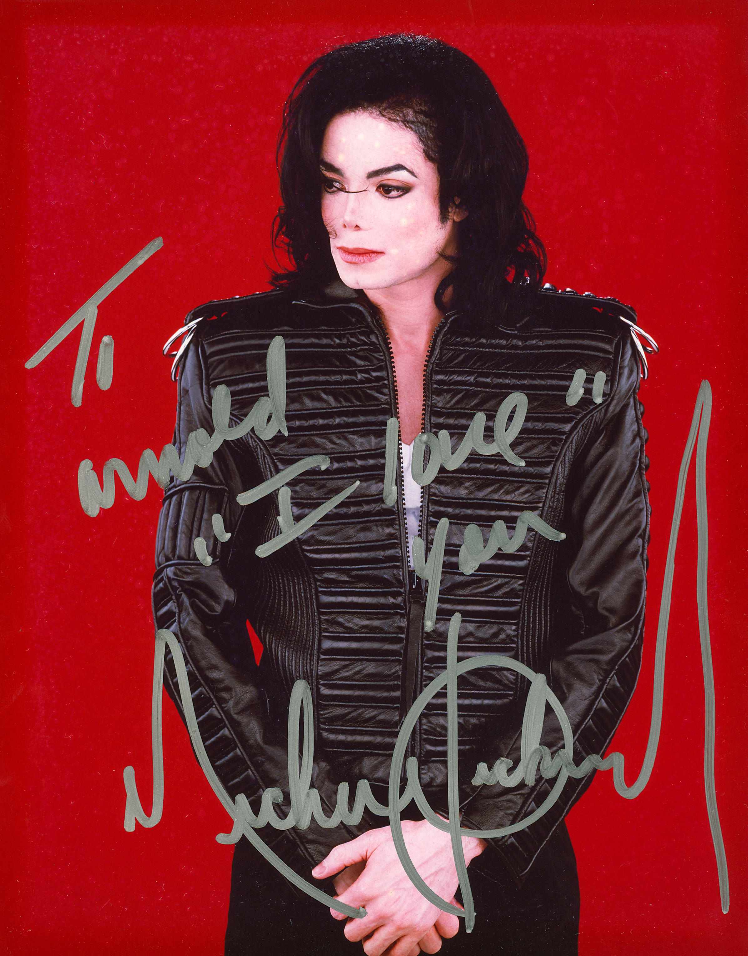 Appraisal: Michael Jackson inscribed and signed photograph Color image of Jackson