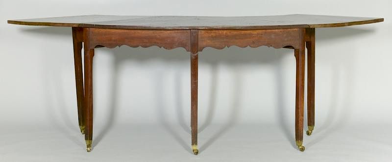 Appraisal: English Chippendale Hunt or Wine Table English Chippendale style mahogany