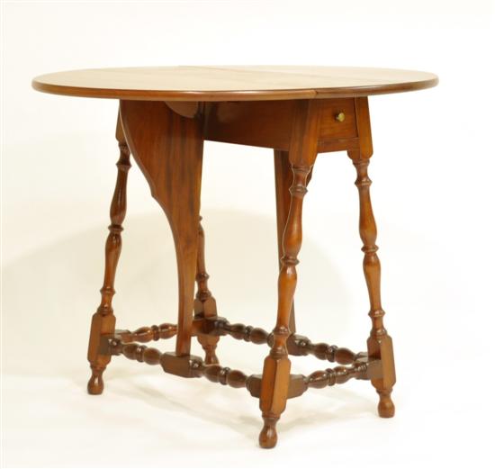 Appraisal: Margolis butterfly dropleaf table - with remnants of Nathan Margolis