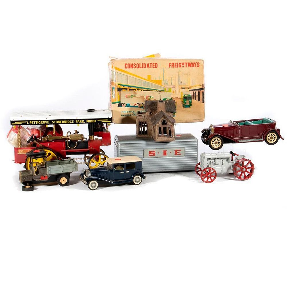 Appraisal: Lot of tin toy vehicles gumball bank ceramic house Wilesco