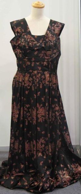 Appraisal: Evening dress in black brocade with floral bands of chinoisserie