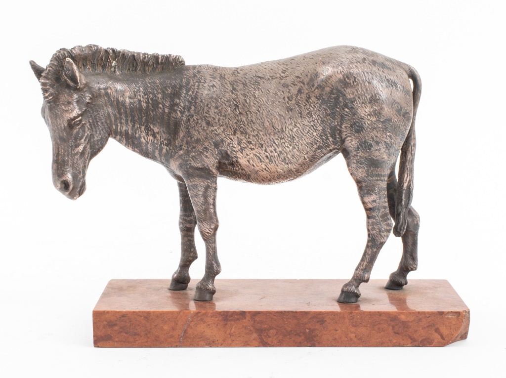 Appraisal: ANTIQUE SILVERPLATE ZEBRA SCULPTURE ON MARBLE BASE Antique silverplate animalier