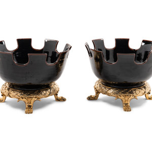 Appraisal: A Pair of Contemporary Ceramic and Gilt Metal Jardini res