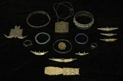 Appraisal: Ancient Glass Bracelets Together with misc ornaments including bone pendants