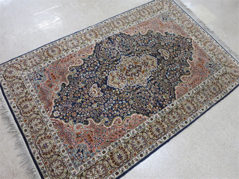 Appraisal: HAND KNOTTED ORIENTAL AREA RUG Pakistani Persian floral and central