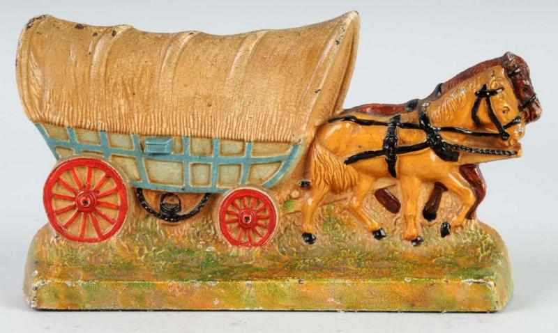 Appraisal: Cast Iron Covered Wagon with Horses Doorstop Description Made by