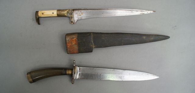 Appraisal: A horn hilted double edged hunting knife and an Afgani