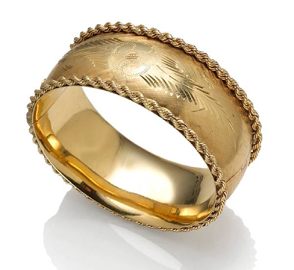 Appraisal: A fourteen karat gold bangle weighing approximately grams diameter in