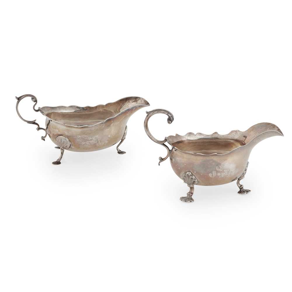 Appraisal: TWO GEORGE III SAUCE BOATS James Crawford Newcastle of traditional