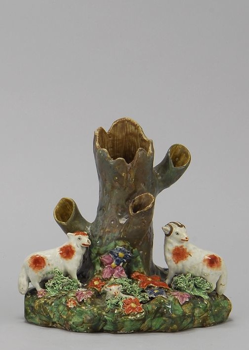 Appraisal: STAFFORDSHIRE FIGURAL SPILL Circa With three sheep and a tree