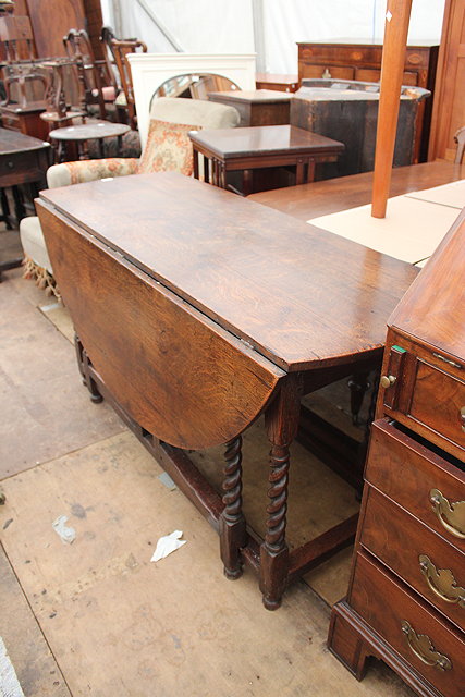 Appraisal: A LATE TH CENTURY EARLY TH CENTURY OAK CIRCULAR DROP