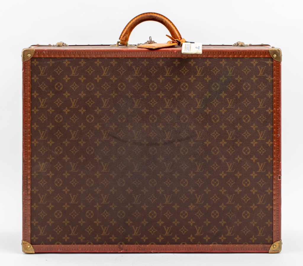 Appraisal: LOUIS VUITTON VINTAGE MONOGRAM SUITCASE Louis Vuitton vintage Monogram suitcase