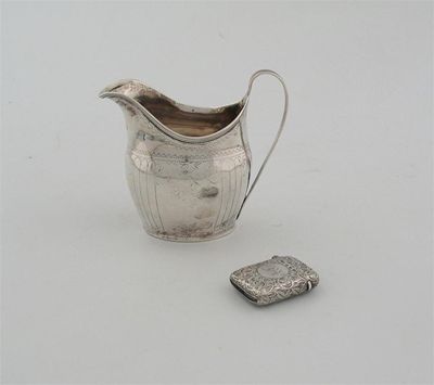 Appraisal: A George III engraved cream jug makers mark worn London