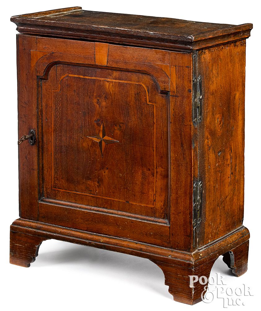 Appraisal: George II elm spice cabinet mid th c George II