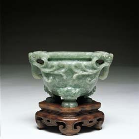 Appraisal: ANTIQUE CARVED JADEITE CENSER Antique Chinese carved jadeite tripod koro