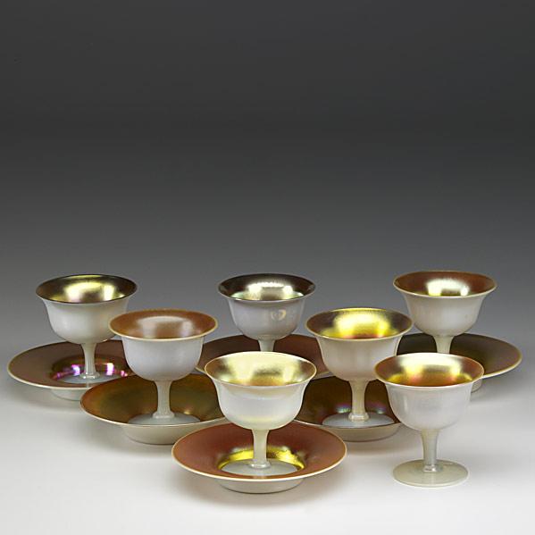 Appraisal: STEUBENSix sets of sherbets with underplates in calcite and gold