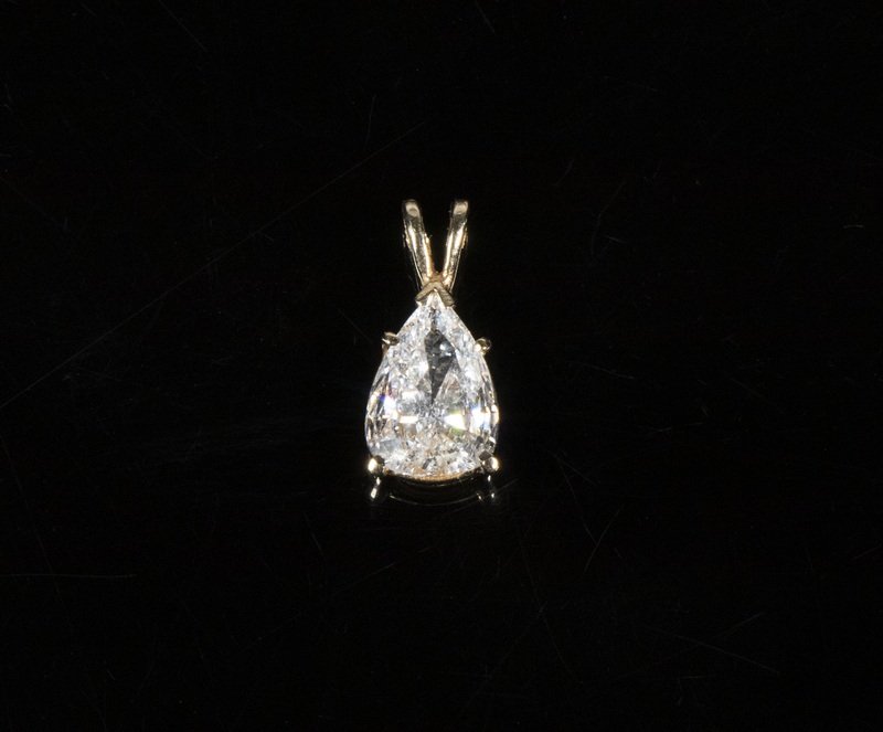 Appraisal: DIAMOND PENDANT K Yellow Gold pendant set with natural pear